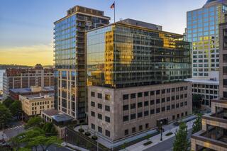Federal Reserve Building Redevelopment exterior in sunset drone