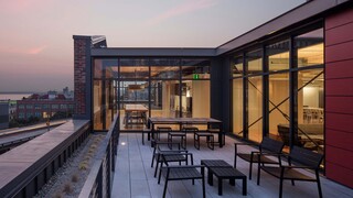 Union Stables rooftop outdoor common area in sunset