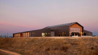 OMD, Colonel Nesmith Readiness Center street view in sunset