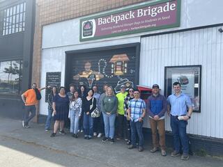 The Lease Crutcher Lewis team volunteering at Backpack Brigade