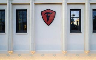 400 Westlake exterior view with Firestone emblem