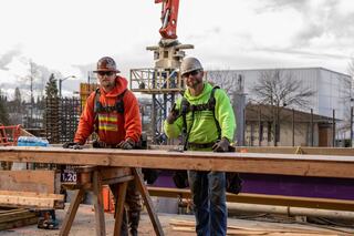 Two carpenters onsite at Population Health