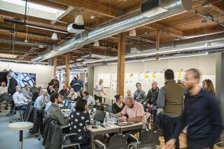 Key stakeholders on the Population Health team meet at Miller Hull