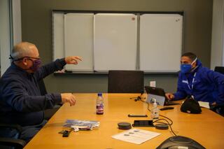 Mentor and mentee talking in the conference room