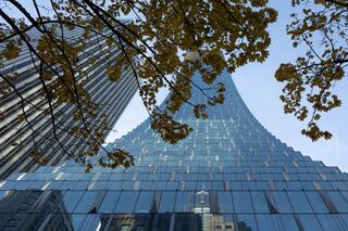 A view of looking up the Rainier Square Tower from the ground level