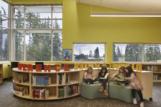 Peter Kirk and Margaret Mead elementary school kids in the library
