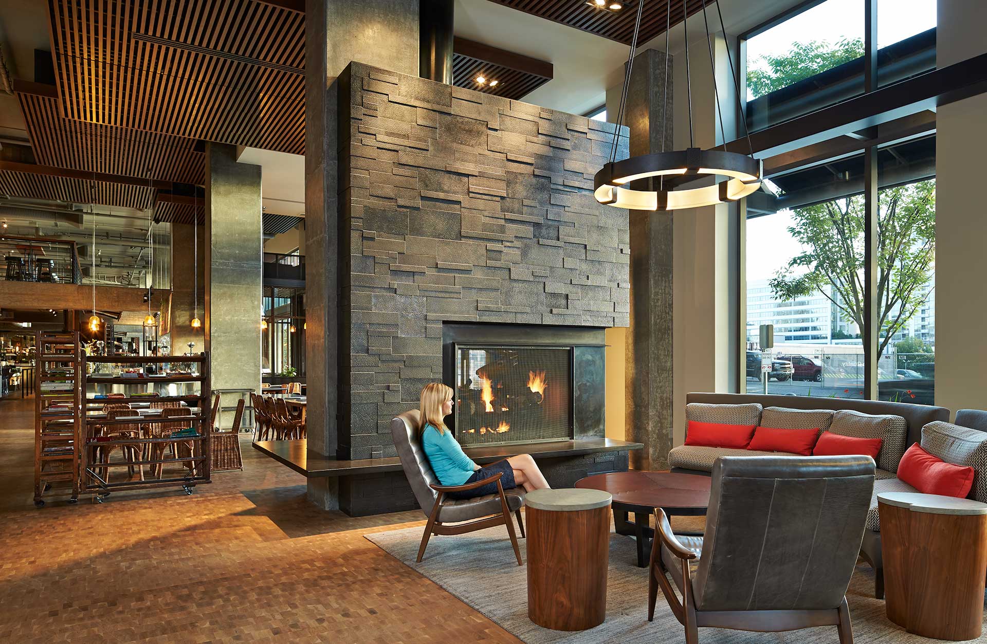 VIA6 Apartments lobby with fireplace