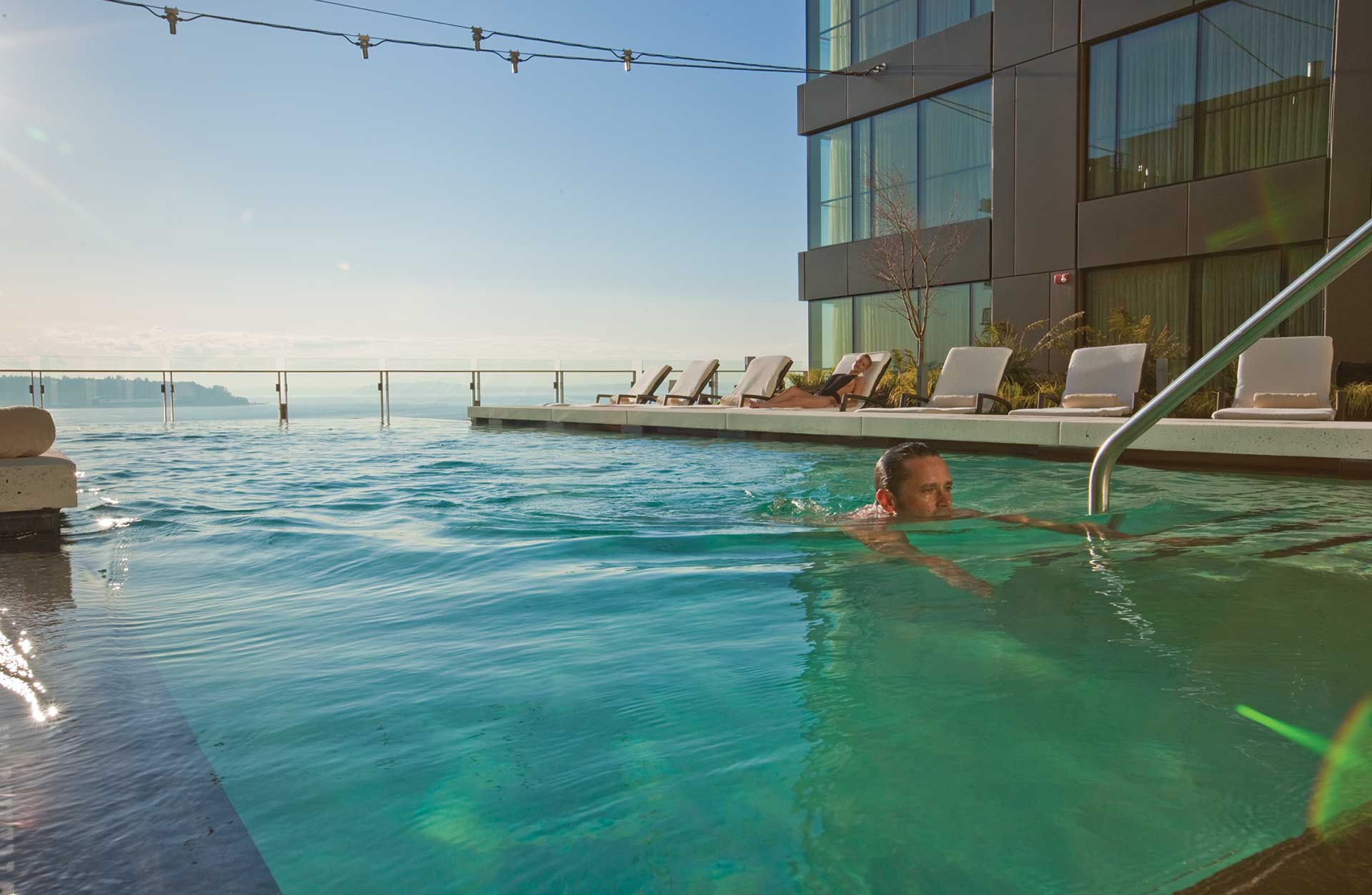 Four Seasons Hotel and Residences Seattle pool with swimmer
